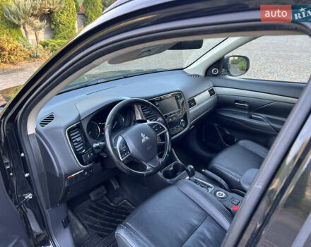 Черный Мицубиси Аутлендер, объемом двигателя 2 л и пробегом 190 тыс. км за 12500 $, фото 18 на Automoto.ua