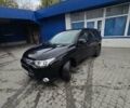 Черный Мицубиси Аутлендер, объемом двигателя 2 л и пробегом 140 тыс. км за 11300 $, фото 3 на Automoto.ua