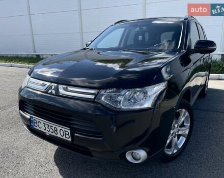 Черный Мицубиси Аутлендер, объемом двигателя 2 л и пробегом 270 тыс. км за 11400 $, фото 2 на Automoto.ua