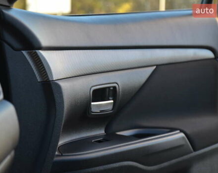 Чорний Міцубісі Аутлендер, об'ємом двигуна 2.2 л та пробігом 237 тис. км за 12550 $, фото 42 на Automoto.ua