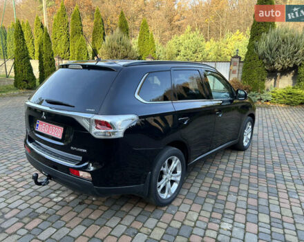 Черный Мицубиси Аутлендер, объемом двигателя 2 л и пробегом 190 тыс. км за 12500 $, фото 5 на Automoto.ua
