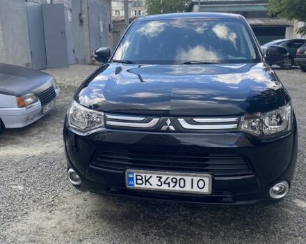 Черный Мицубиси Аутлендер, объемом двигателя 2 л и пробегом 168 тыс. км за 12007 $, фото 1 на Automoto.ua