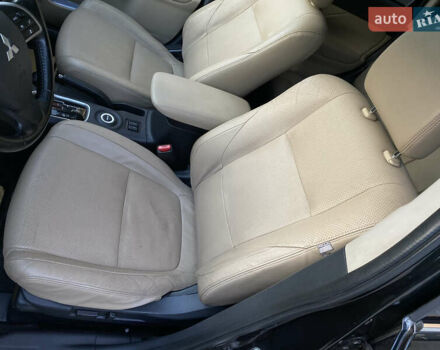 Черный Мицубиси Аутлендер, объемом двигателя 2.27 л и пробегом 241 тыс. км за 14400 $, фото 55 на Automoto.ua