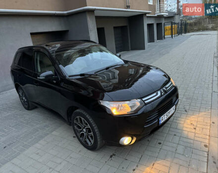 Черный Мицубиси Аутлендер, объемом двигателя 2.27 л и пробегом 241 тыс. км за 14400 $, фото 7 на Automoto.ua
