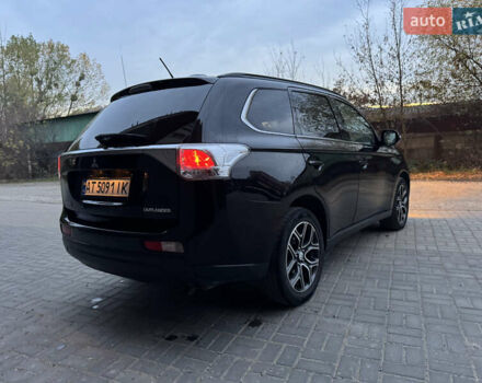 Черный Мицубиси Аутлендер, объемом двигателя 2.27 л и пробегом 241 тыс. км за 14400 $, фото 13 на Automoto.ua