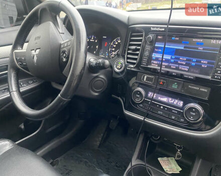 Черный Мицубиси Аутлендер, объемом двигателя 2.27 л и пробегом 280 тыс. км за 11808 $, фото 10 на Automoto.ua