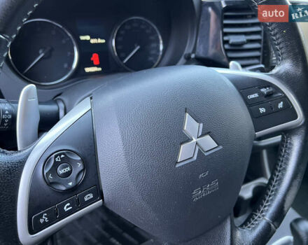 Черный Мицубиси Аутлендер, объемом двигателя 2 л и пробегом 190 тыс. км за 12500 $, фото 22 на Automoto.ua