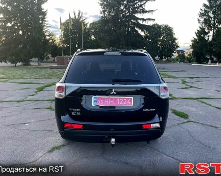 Черный Мицубиси Аутлендер, объемом двигателя 2.3 л и пробегом 219 тыс. км за 13600 $, фото 3 на Automoto.ua
