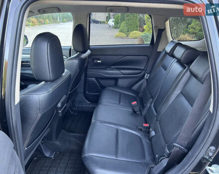 Черный Мицубиси Аутлендер, объемом двигателя 2 л и пробегом 190 тыс. км за 12500 $, фото 23 на Automoto.ua