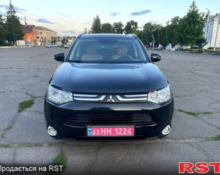 Черный Мицубиси Аутлендер, объемом двигателя 2.3 л и пробегом 219 тыс. км за 13600 $, фото 2 на Automoto.ua