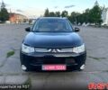Черный Мицубиси Аутлендер, объемом двигателя 2.3 л и пробегом 219 тыс. км за 13600 $, фото 2 на Automoto.ua