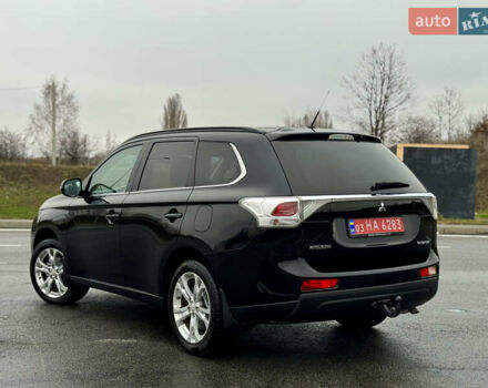 Черный Мицубиси Аутлендер, объемом двигателя 2.2 л и пробегом 250 тыс. км за 12750 $, фото 5 на Automoto.ua