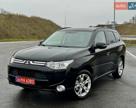 Черный Мицубиси Аутлендер, объемом двигателя 2.2 л и пробегом 250 тыс. км за 12750 $, фото 4 на Automoto.ua