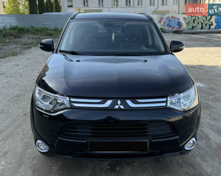 Черный Мицубиси Аутлендер, объемом двигателя 2.27 л и пробегом 240 тыс. км за 13000 $, фото 7 на Automoto.ua