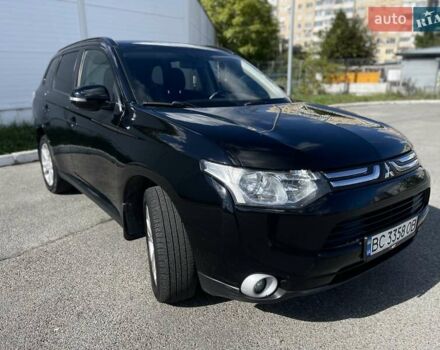 Черный Мицубиси Аутлендер, объемом двигателя 2 л и пробегом 270 тыс. км за 11400 $, фото 4 на Automoto.ua