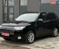Чорний Міцубісі Аутлендер, об'ємом двигуна 2 л та пробігом 213 тис. км за 13888 $, фото 4 на Automoto.ua