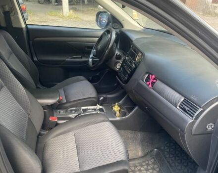 Черный Мицубиси Аутлендер, объемом двигателя 2 л и пробегом 168 тыс. км за 12007 $, фото 4 на Automoto.ua