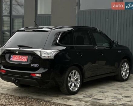 Чорний Міцубісі Аутлендер, об'ємом двигуна 2 л та пробігом 213 тис. км за 13888 $, фото 6 на Automoto.ua