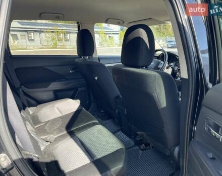 Черный Мицубиси Аутлендер, объемом двигателя 2 л и пробегом 270 тыс. км за 11400 $, фото 16 на Automoto.ua