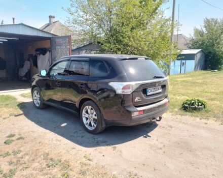 Черный Мицубиси Аутлендер, объемом двигателя 2.4 л и пробегом 300 тыс. км за 11000 $, фото 3 на Automoto.ua