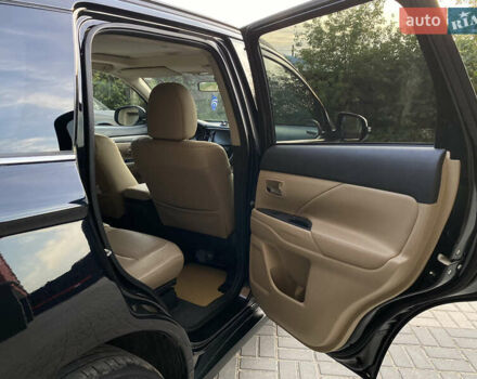 Черный Мицубиси Аутлендер, объемом двигателя 2.27 л и пробегом 241 тыс. км за 14400 $, фото 31 на Automoto.ua