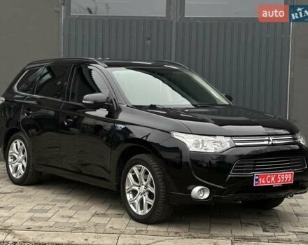 Чорний Міцубісі Аутлендер, об'ємом двигуна 2 л та пробігом 213 тис. км за 13888 $, фото 37 на Automoto.ua