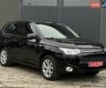 Чорний Міцубісі Аутлендер, об'ємом двигуна 2 л та пробігом 213 тис. км за 13888 $, фото 37 на Automoto.ua