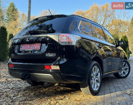 Чорний Міцубісі Аутлендер, об'ємом двигуна 2 л та пробігом 173 тис. км за 15299 $, фото 53 на Automoto.ua