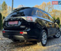Чорний Міцубісі Аутлендер, об'ємом двигуна 2 л та пробігом 173 тис. км за 15299 $, фото 53 на Automoto.ua