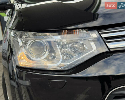 Чорний Міцубісі Аутлендер, об'ємом двигуна 2 л та пробігом 157 тис. км за 15299 $, фото 7 на Automoto.ua