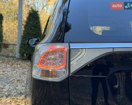 Чорний Міцубісі Аутлендер, об'ємом двигуна 2 л та пробігом 173 тис. км за 15299 $, фото 66 на Automoto.ua