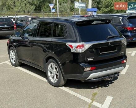 Черный Мицубиси Аутлендер, объемом двигателя 2.4 л и пробегом 231 тыс. км за 12600 $, фото 4 на Automoto.ua