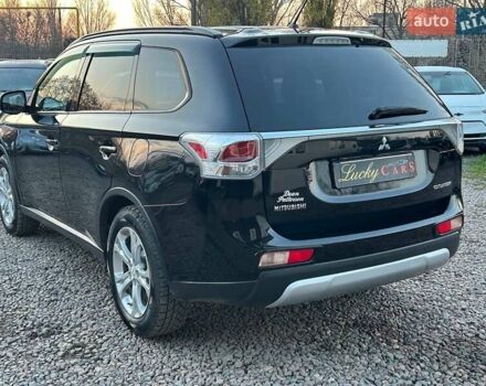 Чорний Міцубісі Аутлендер, об'ємом двигуна 2.4 л та пробігом 199 тис. км за 12800 $, фото 6 на Automoto.ua