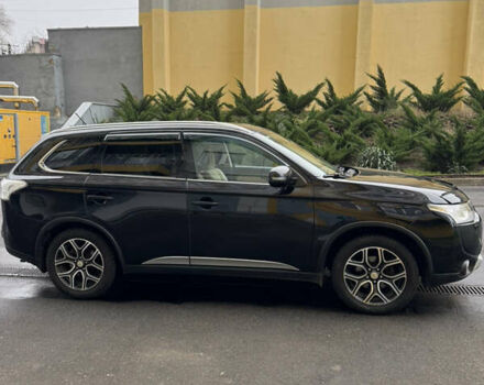 Черный Мицубиси Аутлендер, объемом двигателя 2.27 л и пробегом 244 тыс. км за 14000 $, фото 10 на Automoto.ua