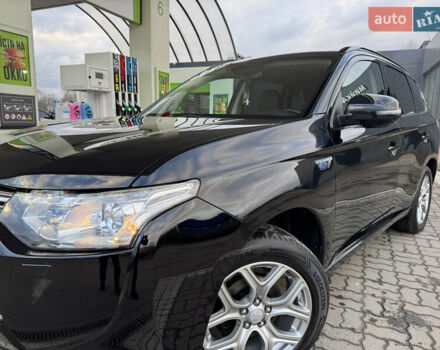 Чорний Міцубісі Аутлендер, об'ємом двигуна 2 л та пробігом 157 тис. км за 15299 $, фото 31 на Automoto.ua