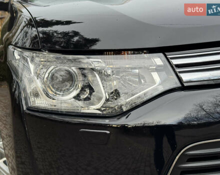 Черный Мицубиси Аутлендер, объемом двигателя 2 л и пробегом 173 тыс. км за 15299 $, фото 7 на Automoto.ua