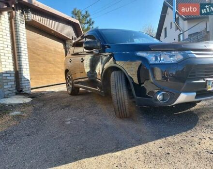 Черный Мицубиси Аутлендер, объемом двигателя 2.4 л и пробегом 183 тыс. км за 15000 $, фото 5 на Automoto.ua