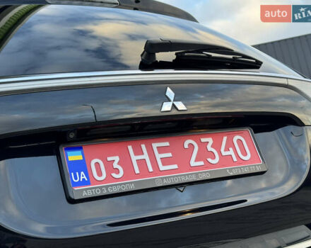 Чорний Міцубісі Аутлендер, об'ємом двигуна 2 л та пробігом 157 тис. км за 15299 $, фото 60 на Automoto.ua