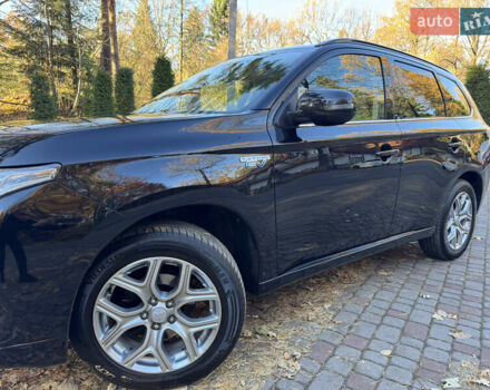 Чорний Міцубісі Аутлендер, об'ємом двигуна 2 л та пробігом 173 тис. км за 15299 $, фото 36 на Automoto.ua