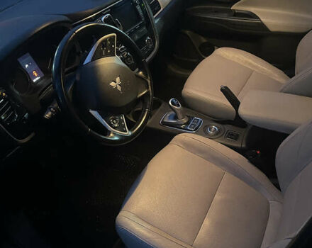 Черный Мицубиси Аутлендер, объемом двигателя 2 л и пробегом 206 тыс. км за 14500 $, фото 3 на Automoto.ua