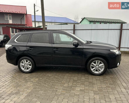Черный Мицубиси Аутлендер, объемом двигателя 2 л и пробегом 223 тыс. км за 13400 $, фото 3 на Automoto.ua