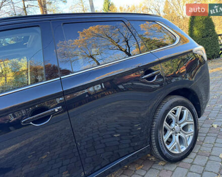 Чорний Міцубісі Аутлендер, об'ємом двигуна 2 л та пробігом 173 тис. км за 15299 $, фото 41 на Automoto.ua