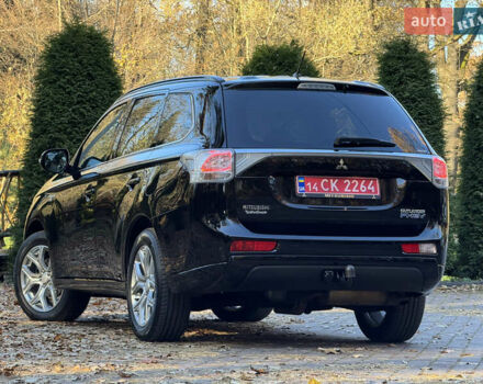 Чорний Міцубісі Аутлендер, об'ємом двигуна 2 л та пробігом 173 тис. км за 15299 $, фото 60 на Automoto.ua