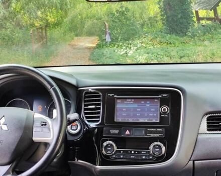 Чорний Міцубісі Аутлендер, об'ємом двигуна 2.36 л та пробігом 275 тис. км за 11700 $, фото 15 на Automoto.ua