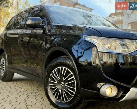 Черный Мицубиси Аутлендер, объемом двигателя 2.4 л и пробегом 270 тыс. км за 12500 $, фото 4 на Automoto.ua