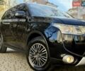 Черный Мицубиси Аутлендер, объемом двигателя 2.4 л и пробегом 270 тыс. км за 12500 $, фото 4 на Automoto.ua