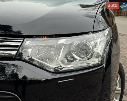 Черный Мицубиси Аутлендер, объемом двигателя 2 л и пробегом 173 тыс. км за 15299 $, фото 24 на Automoto.ua