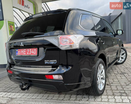 Чорний Міцубісі Аутлендер, об'ємом двигуна 2 л та пробігом 157 тис. км за 15299 $, фото 42 на Automoto.ua