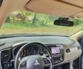 Чорний Міцубісі Аутлендер, об'ємом двигуна 2.36 л та пробігом 275 тис. км за 11700 $, фото 1 на Automoto.ua