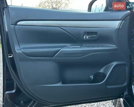 Чорний Міцубісі Аутлендер, об'ємом двигуна 2.4 л та пробігом 199 тис. км за 12800 $, фото 11 на Automoto.ua